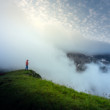 Man and misty morning in Dolomites...